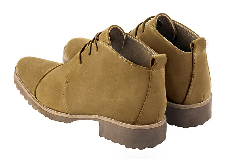 Women's camel beige elegant ankle boots, with laces at the front. Round toe. Thick rubber soles - Rear view